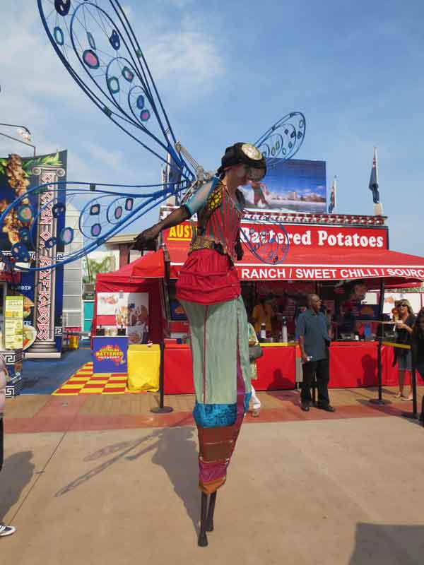 http://www.laobserved.com/intell/assets/OCFair-stiltwalker3-July19-.jpg