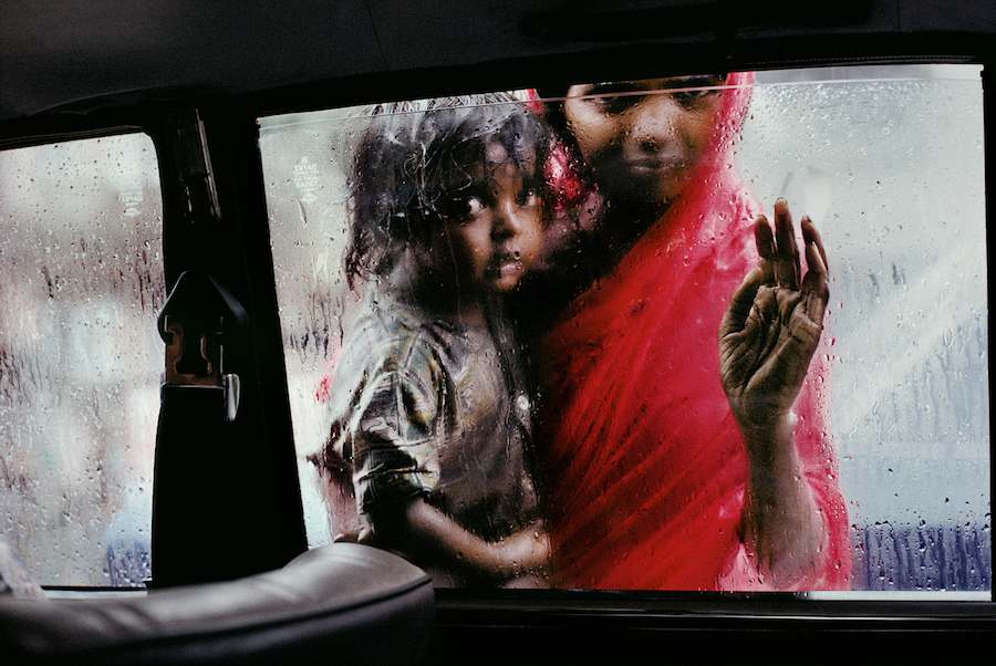 http://www.laobserved.com/intell/assets/mccurry-mother-child.jpg